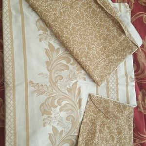 2 king size shams, new. Cotton and polyester.